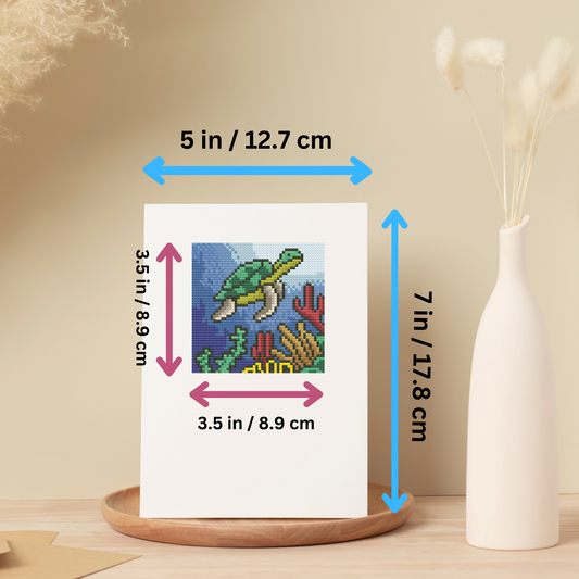 Complete cross-stitch kit contents, including pattern, embroidery floss, Aida cloth, pre-folded card, envelope, and accessories.