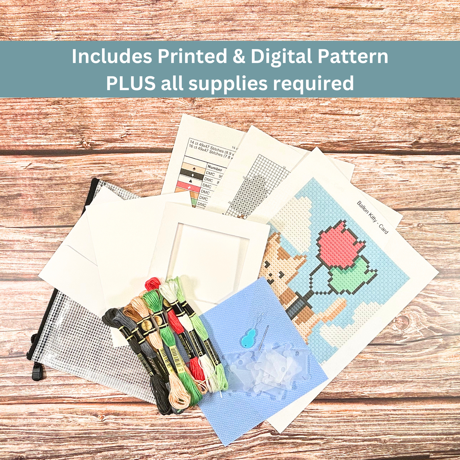 Complete cross-stitch kit including Aida cloth, embroidery floss, pattern sheets, and greeting card materials.