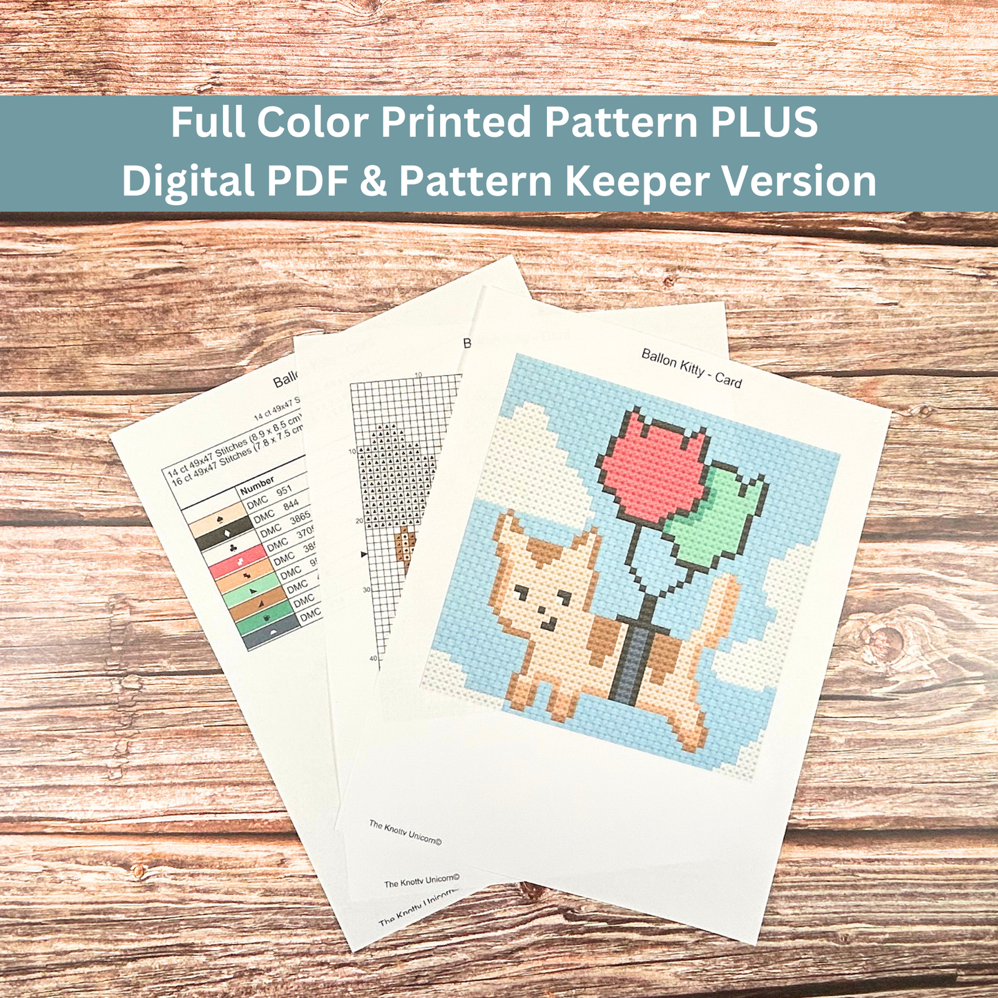 Printed cross-stitch pattern sheets for a floating cat with balloons design, including a color key and stitch guide.