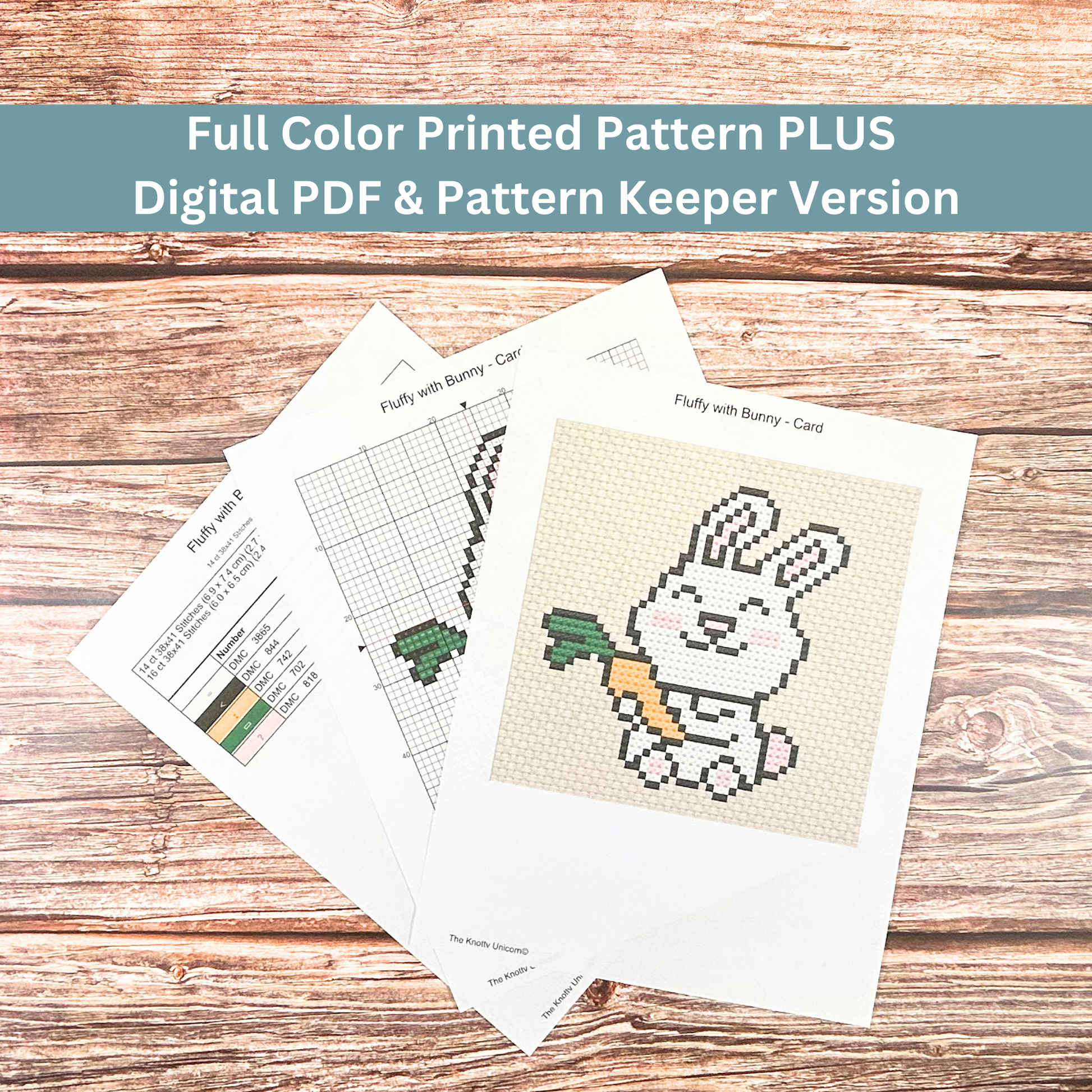 Printed cross-stitch pattern sheets for a bunny with carrot design, including a color key and stitch guide.