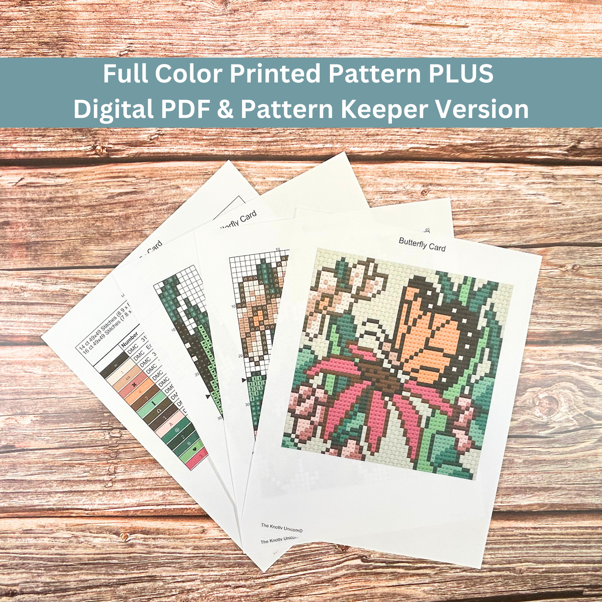 Printed cross-stitch pattern sheets for a butterfly and flower design, including a color key and stitch guide.