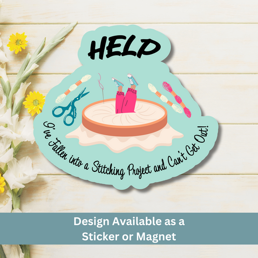 Flat lay of crafting magnet with embroidery tools and humorous stitching quote on light wood