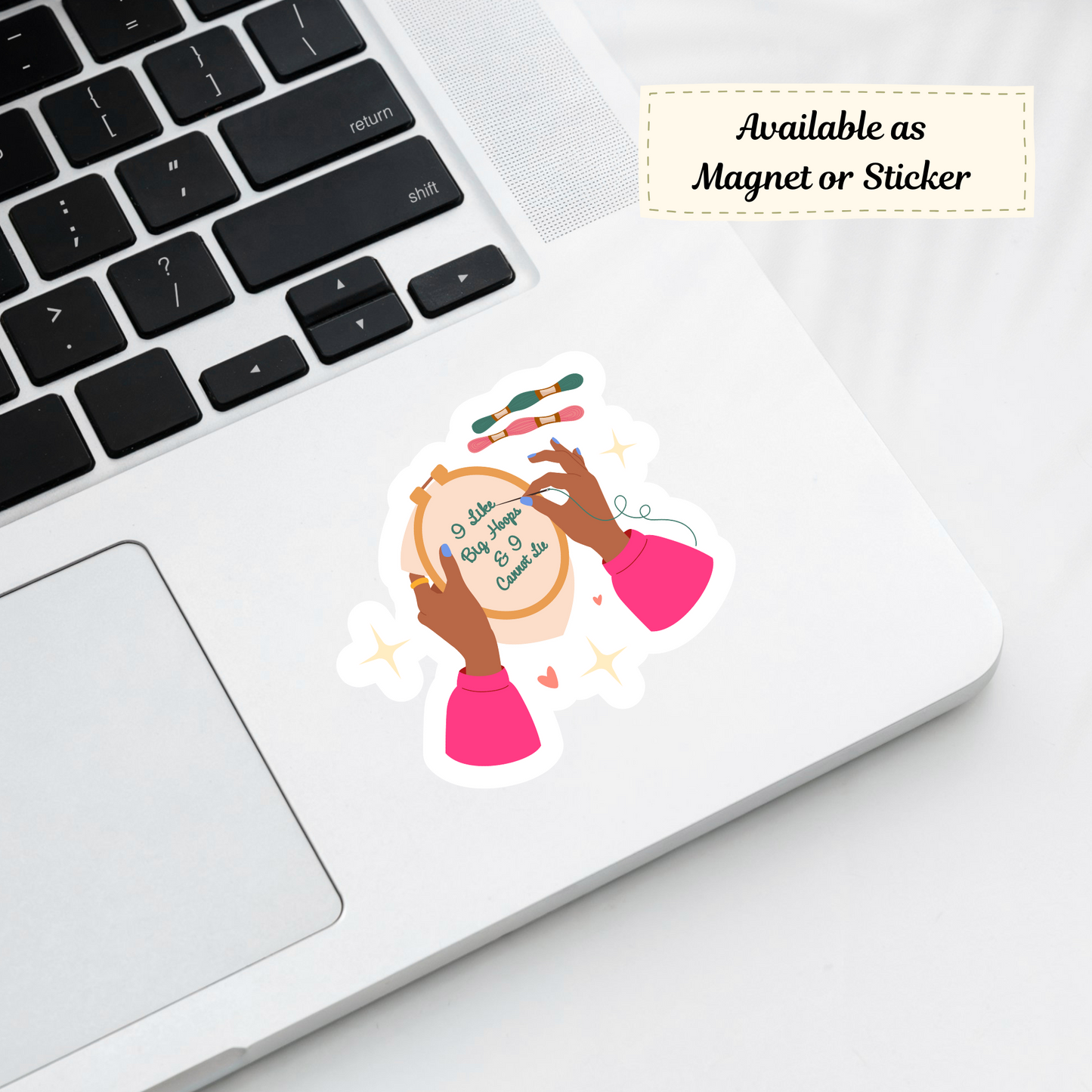 Sticker featuring big embroidery hoop humor applied to a laptop