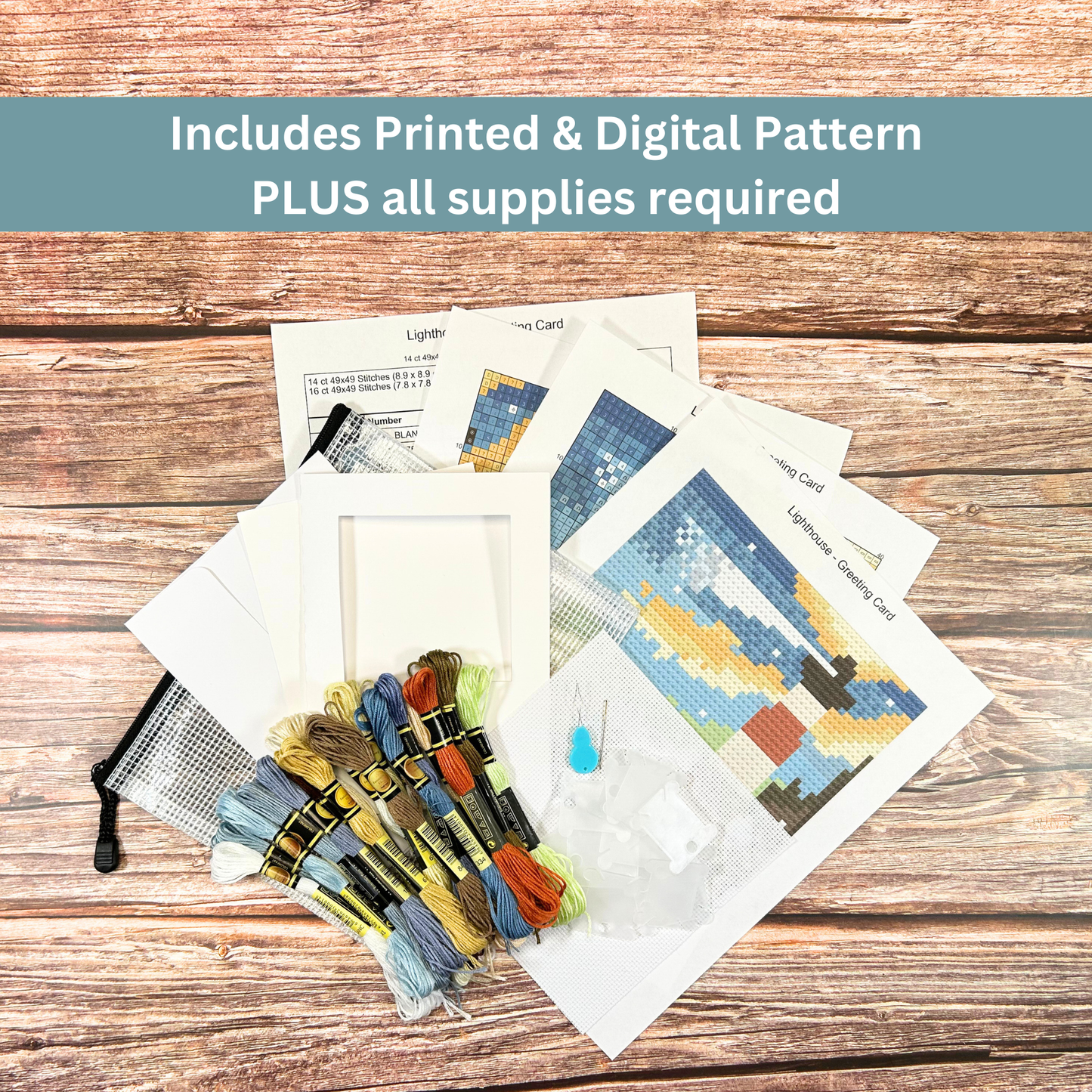 Complete cross-stitch kit for a lighthouse greeting card, including printed pattern, threads, needle, and aperture card.