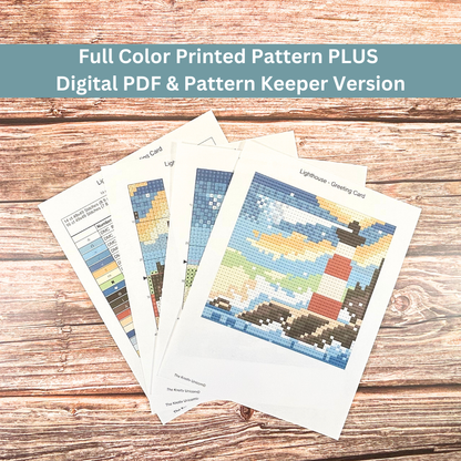 Full-color printed cross-stitch pattern of a lighthouse with ocean waves and a sunset sky.