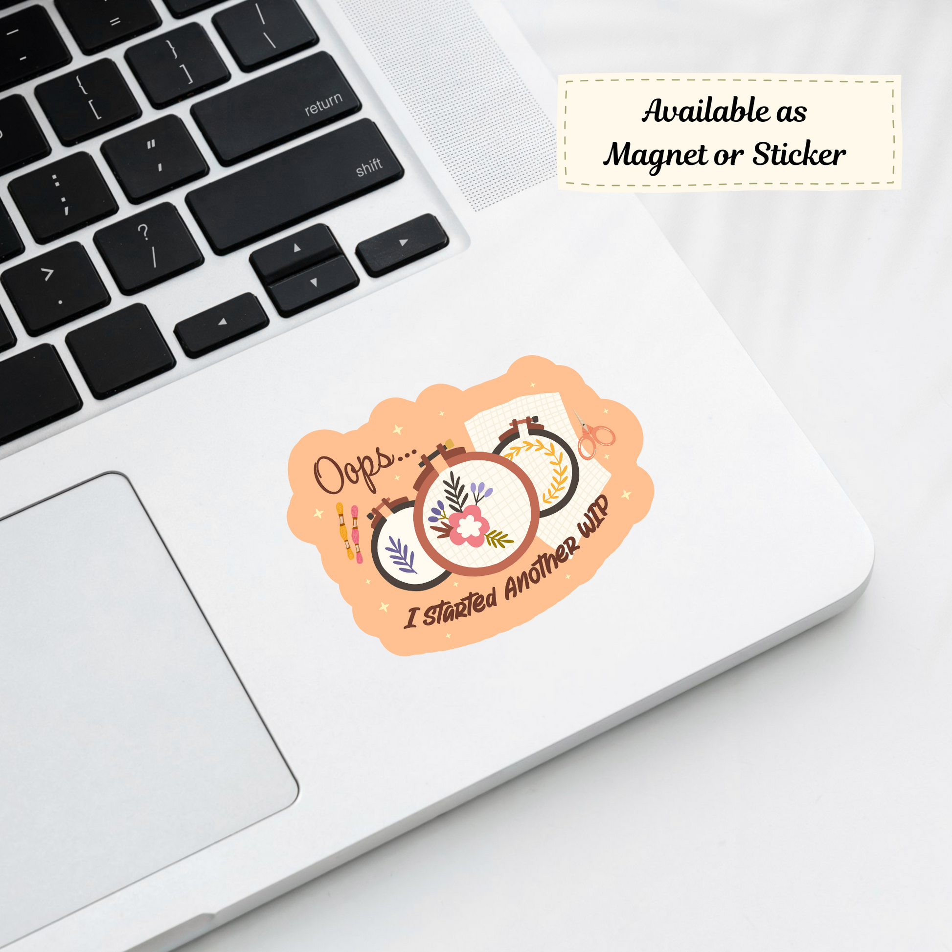 ‘Oops... I Started Another WIP’ sticker on laptop corner, ideal for stitchers and crafters