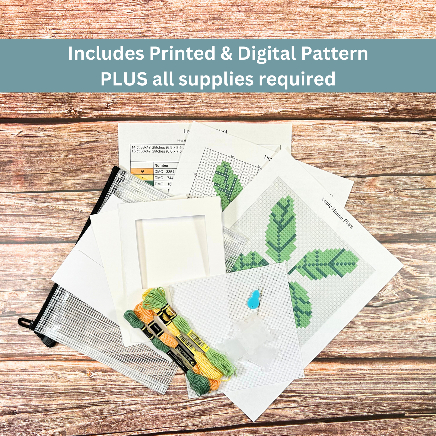 Complete cross-stitch kit including Aida cloth, embroidery floss, pattern sheets, and greeting card materials.