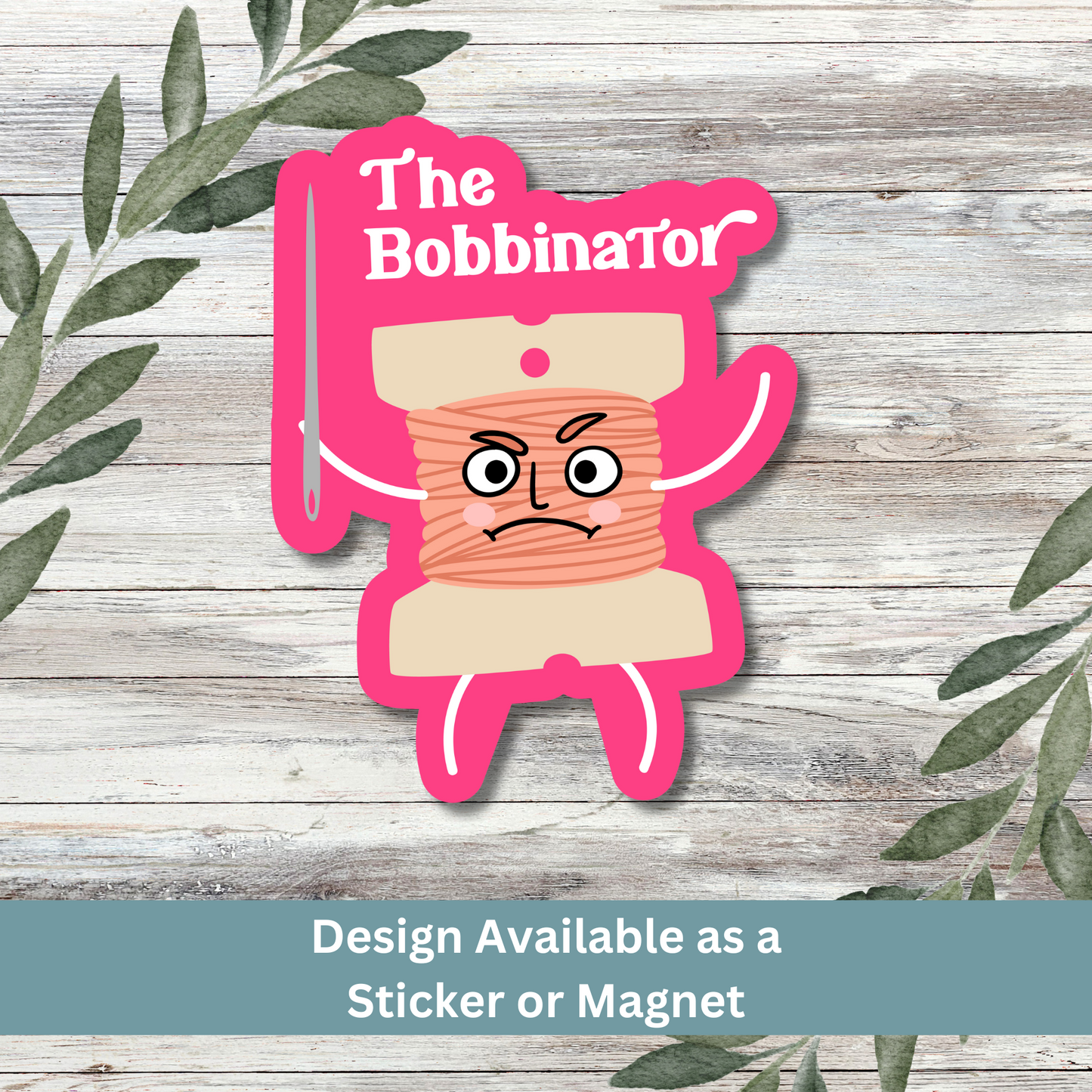 ‘The Bobbinator’ sticker displayed on whitewashed wood background with bold pink design