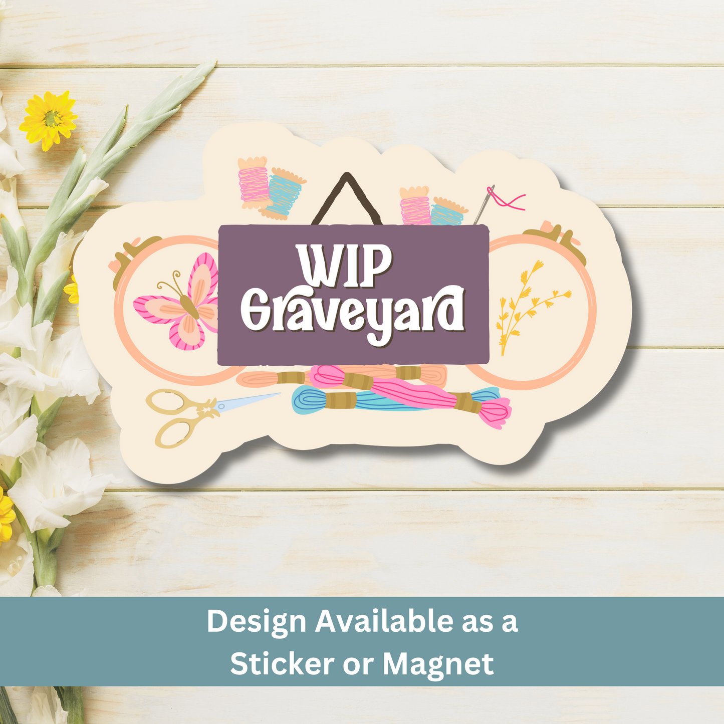 Magnet featuring floss, hoops, and a sign labeled “WIP Graveyard” on wood