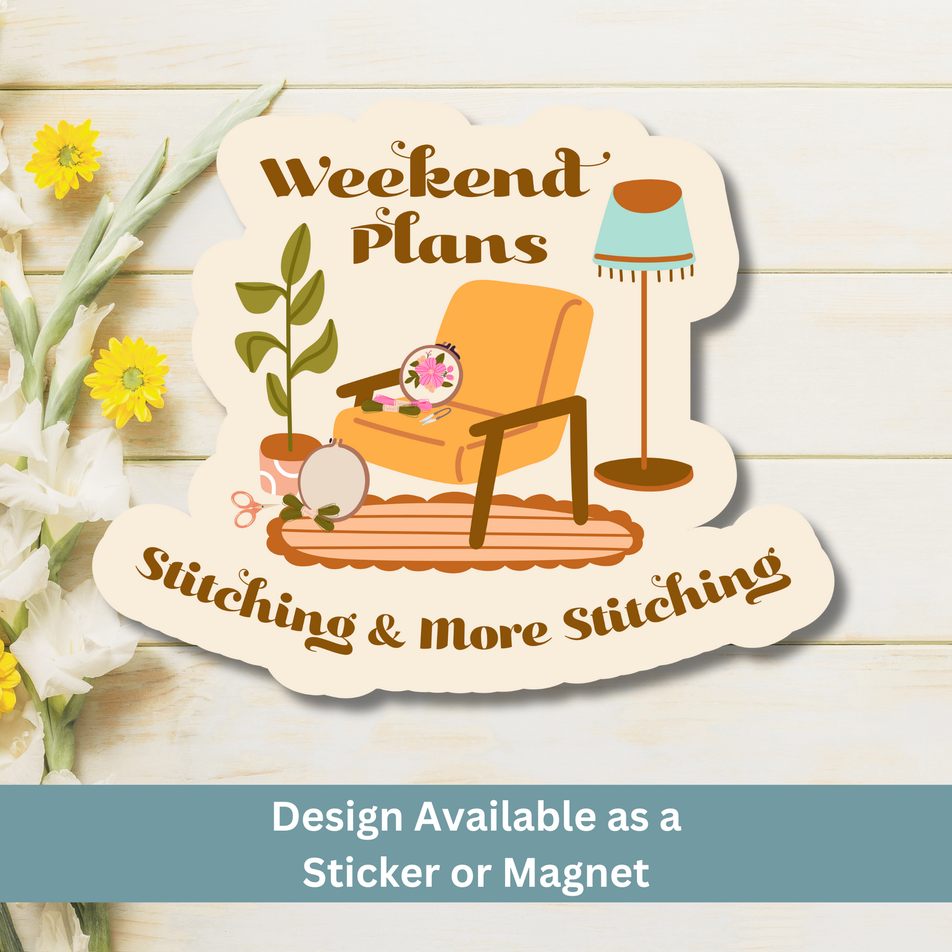 A magnet with chair, lamp, hoop, and cat on a wooden flat lay, reading “Weekend Plans”